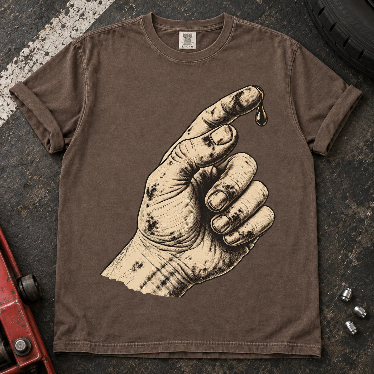 Espresso car enthusiast T-shirt. An oily hand examines a drop of fluid in a text-free maintenance illustration.