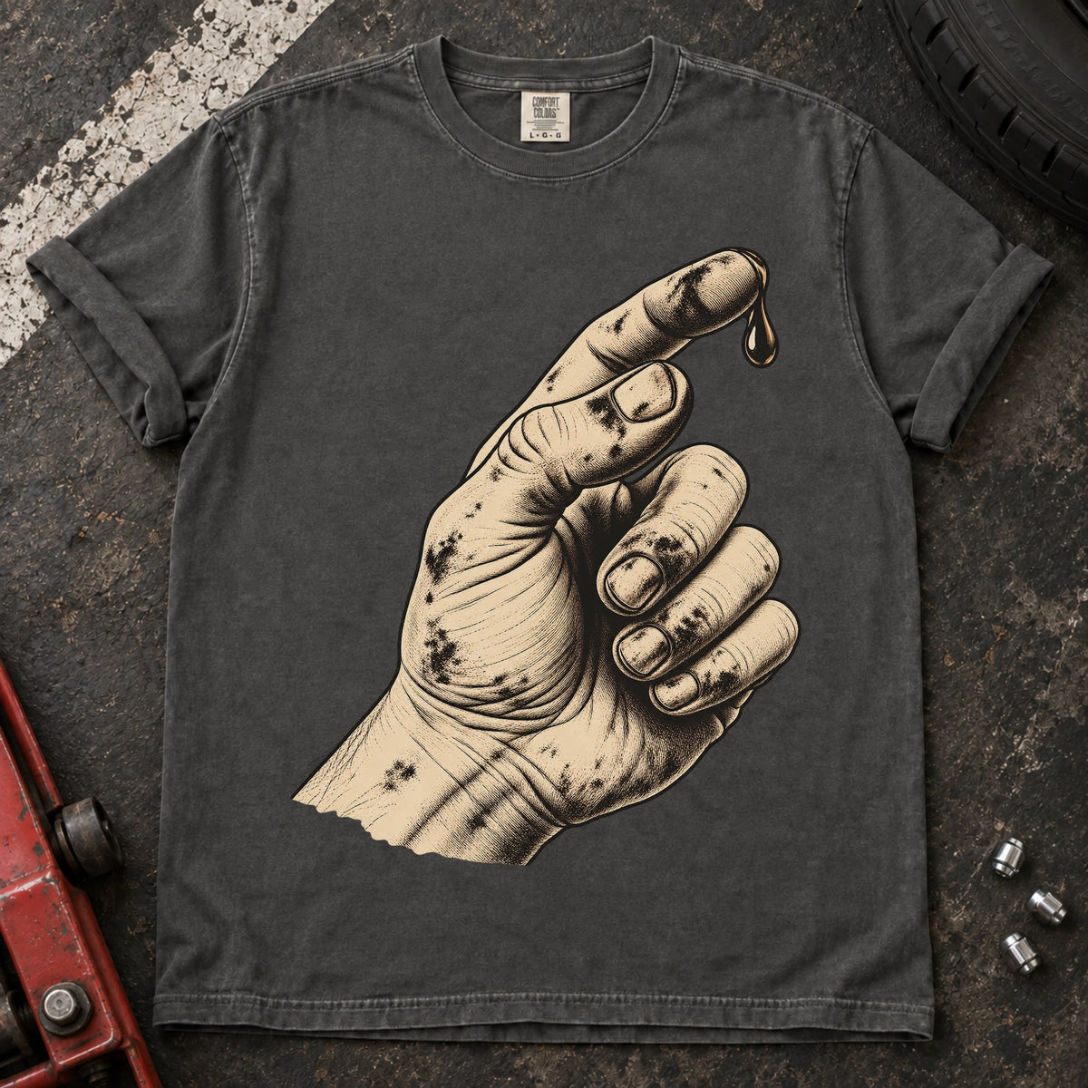 Pepper car enthusiast T-shirt. An oily hand examines a drop of fluid in a text-free maintenance illustration.