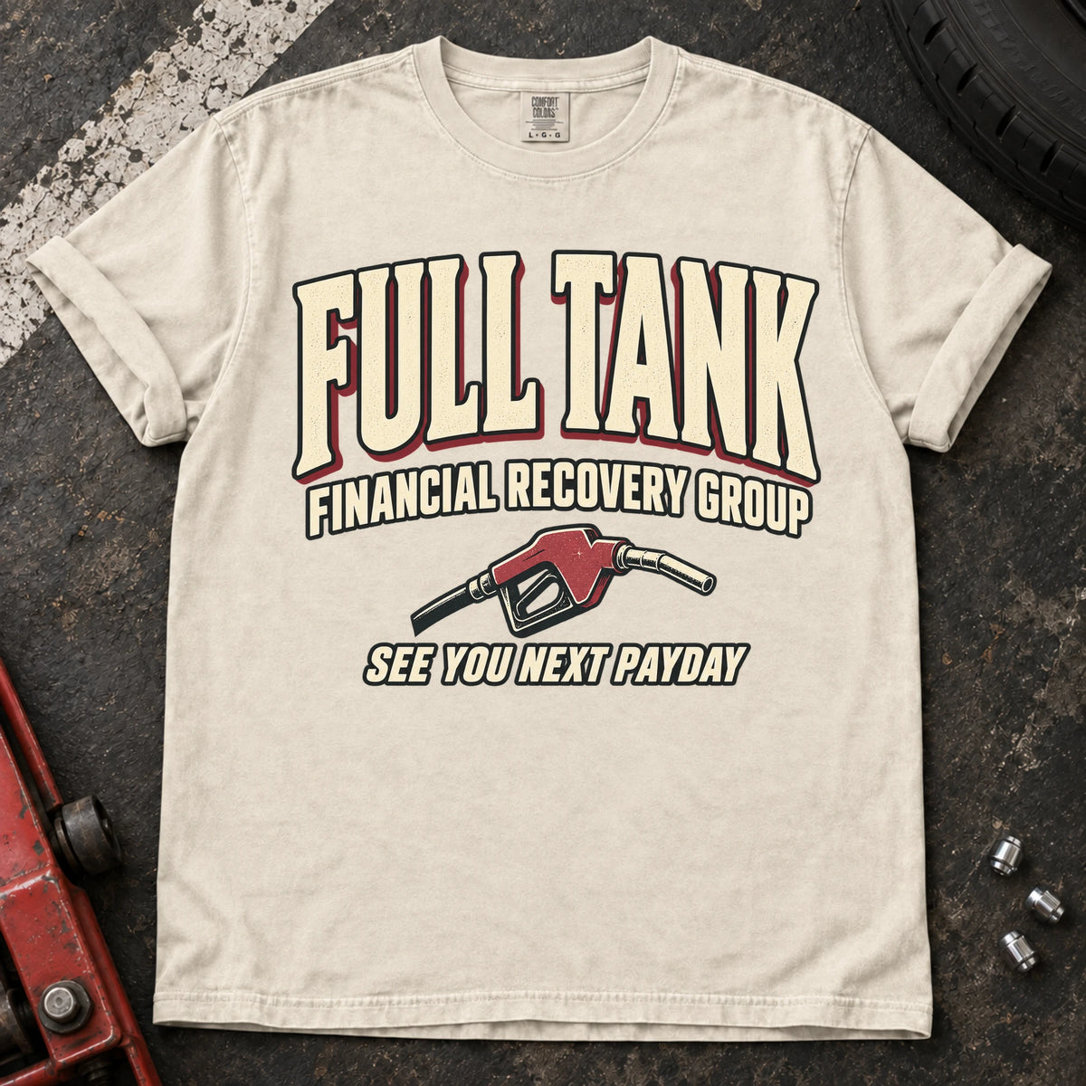 Ivory car enthusiast T-shirt. A fuel nozzle welcomes the Full Tank Financial Recovery Group until next payday.