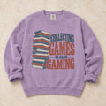 Orchid gaming sweatshirt. A tall stack of cases declares collecting games is also gaming.
