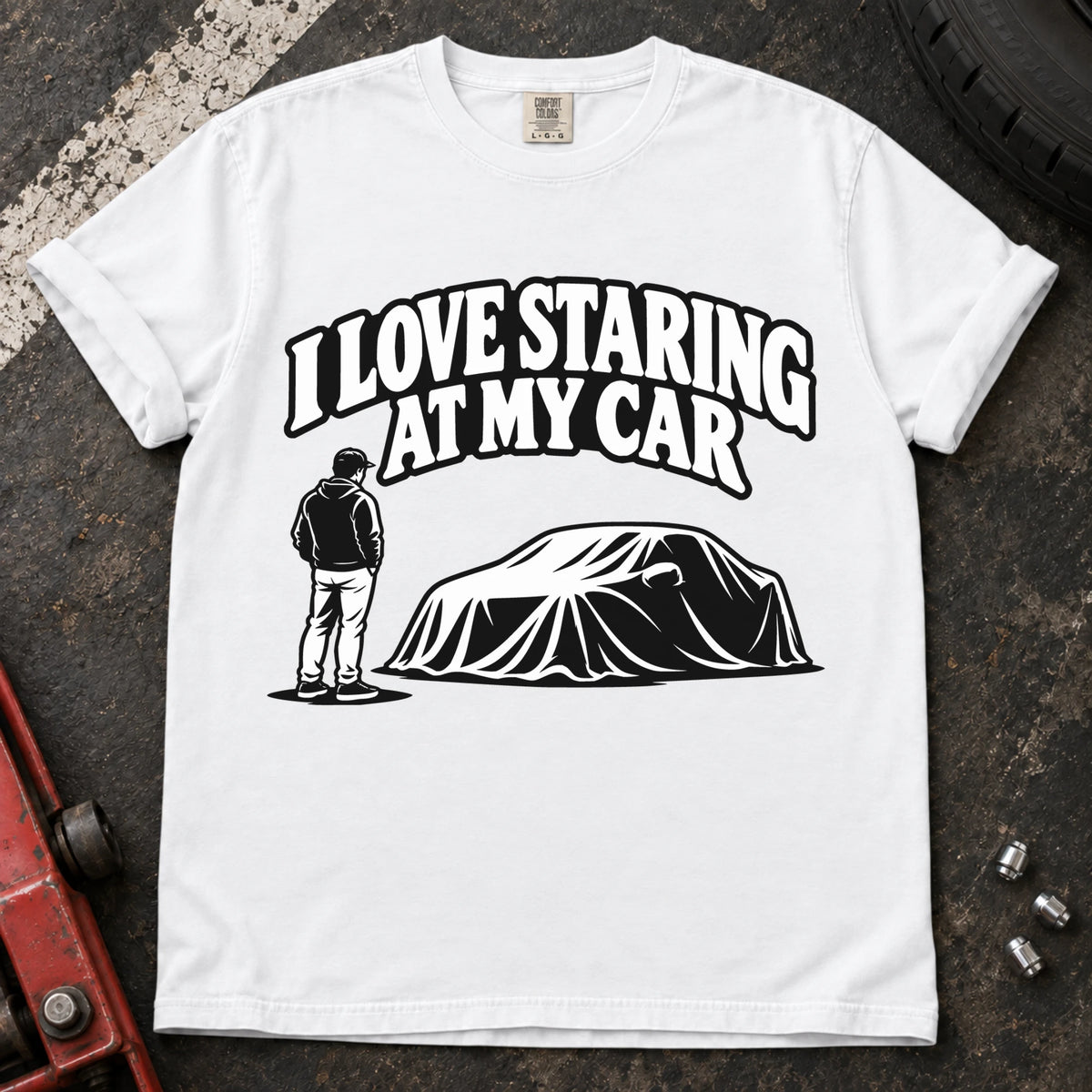 White T-shirt showing a person beside a covered car under 'I love staring at my car'.