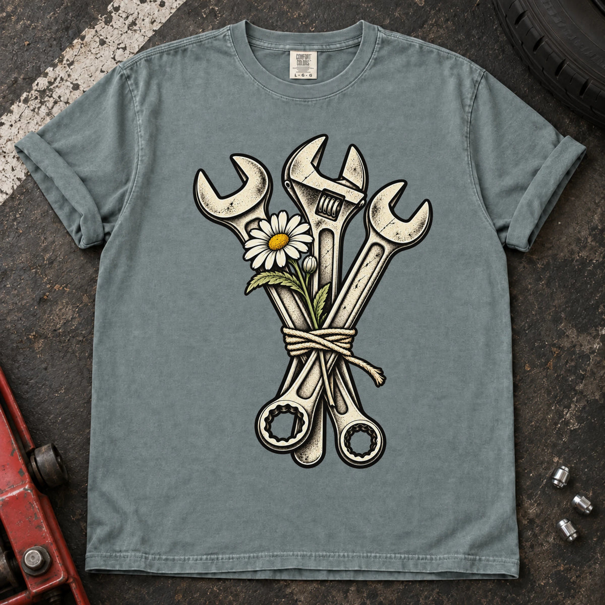 Bay car enthusiast T-shirt. A bouquet of wrenches and a flower gives garage romance a mechanical twist.