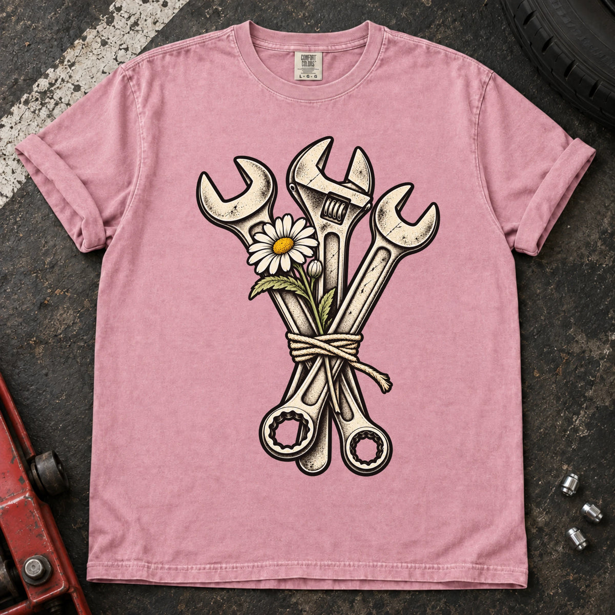Blossom car enthusiast T-shirt. A bouquet of wrenches and a flower gives garage romance a mechanical twist.