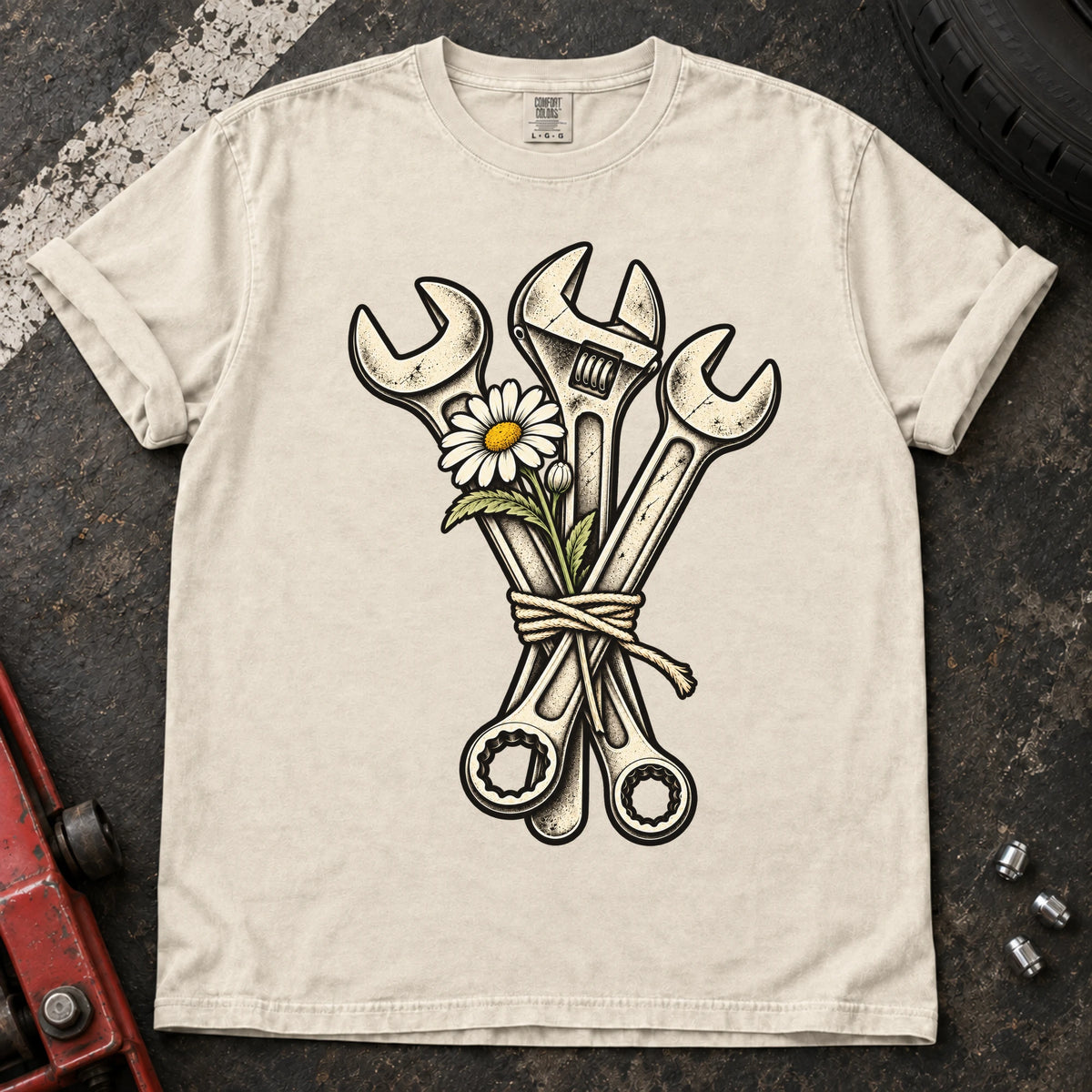 Ivory car enthusiast T-shirt. A bouquet of wrenches and a flower gives garage romance a mechanical twist.