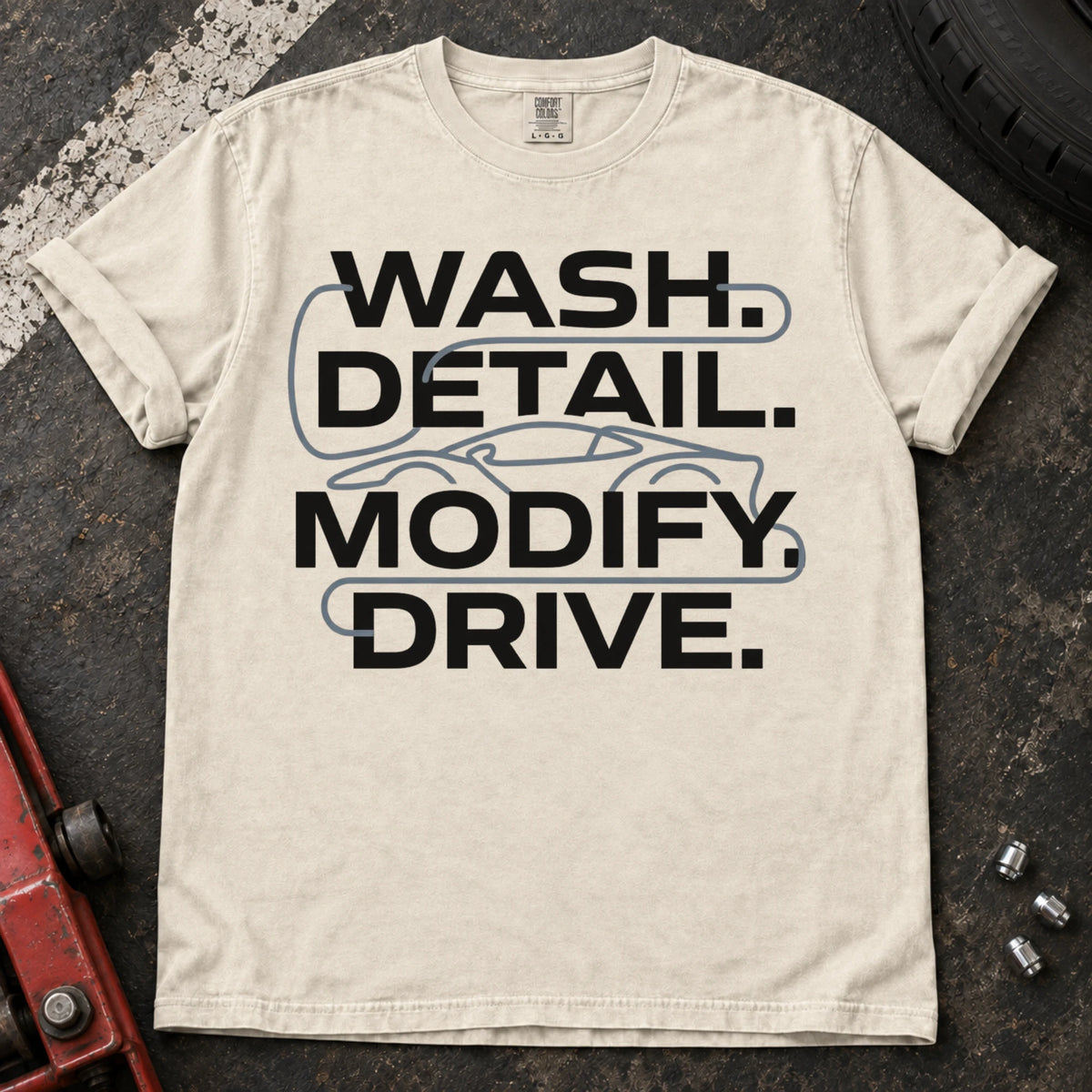 Ivory car enthusiast T-shirt. A car outline connects wash, detail, modify and drive.