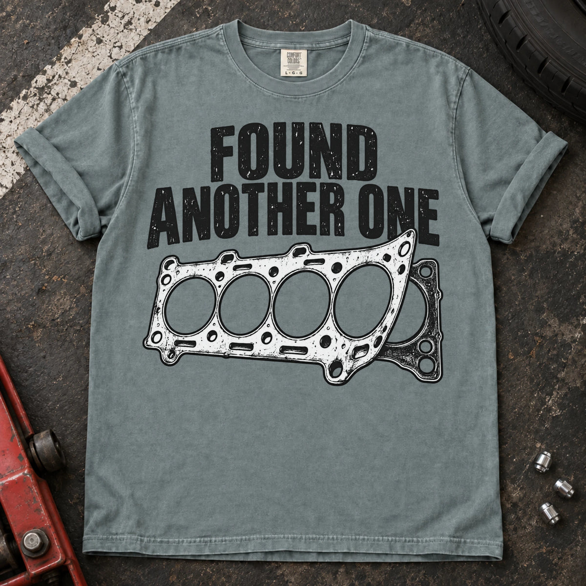 Bay car enthusiast T-shirt. Layered head gaskets and found another one lettering capture recurring repair humor.