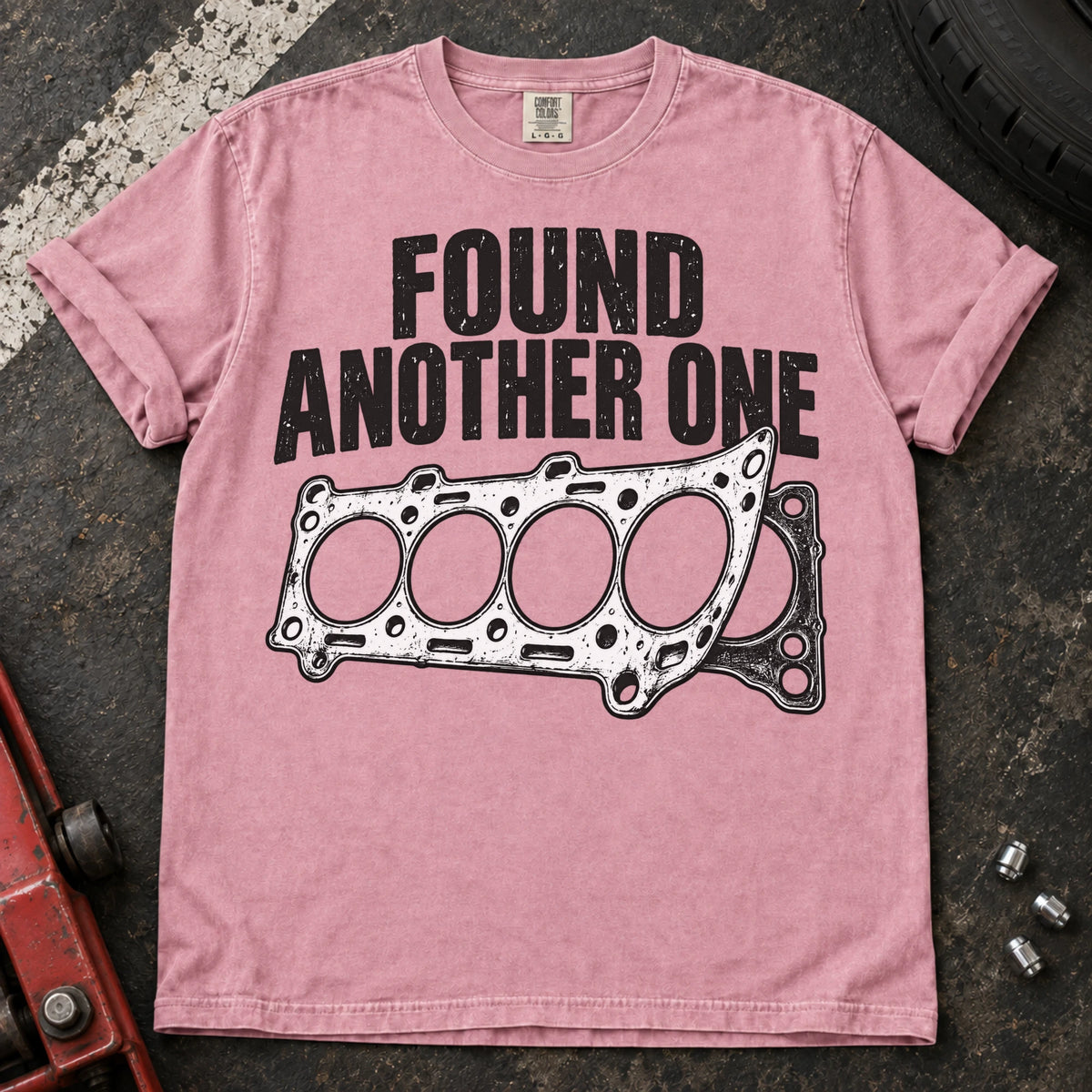 Blossom car enthusiast T-shirt. Layered head gaskets and found another one lettering capture recurring repair humor.