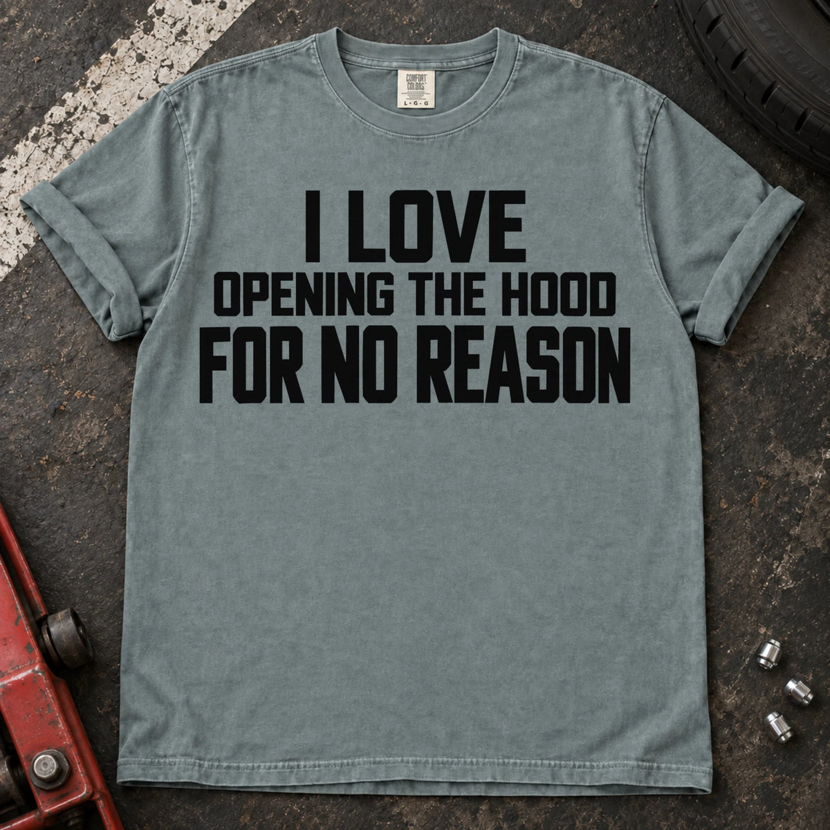 Bay T-shirt with bold lettering reading 'I love opening the hood for no reason'.
