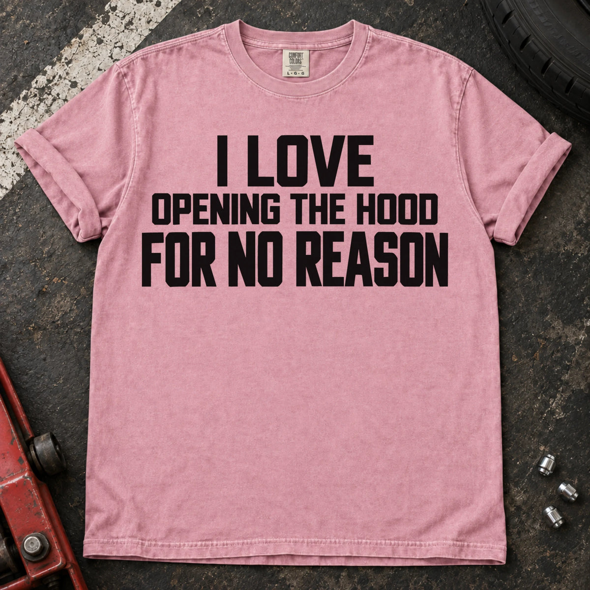 Blossom T-shirt with bold lettering reading 'I love opening the hood for no reason'.