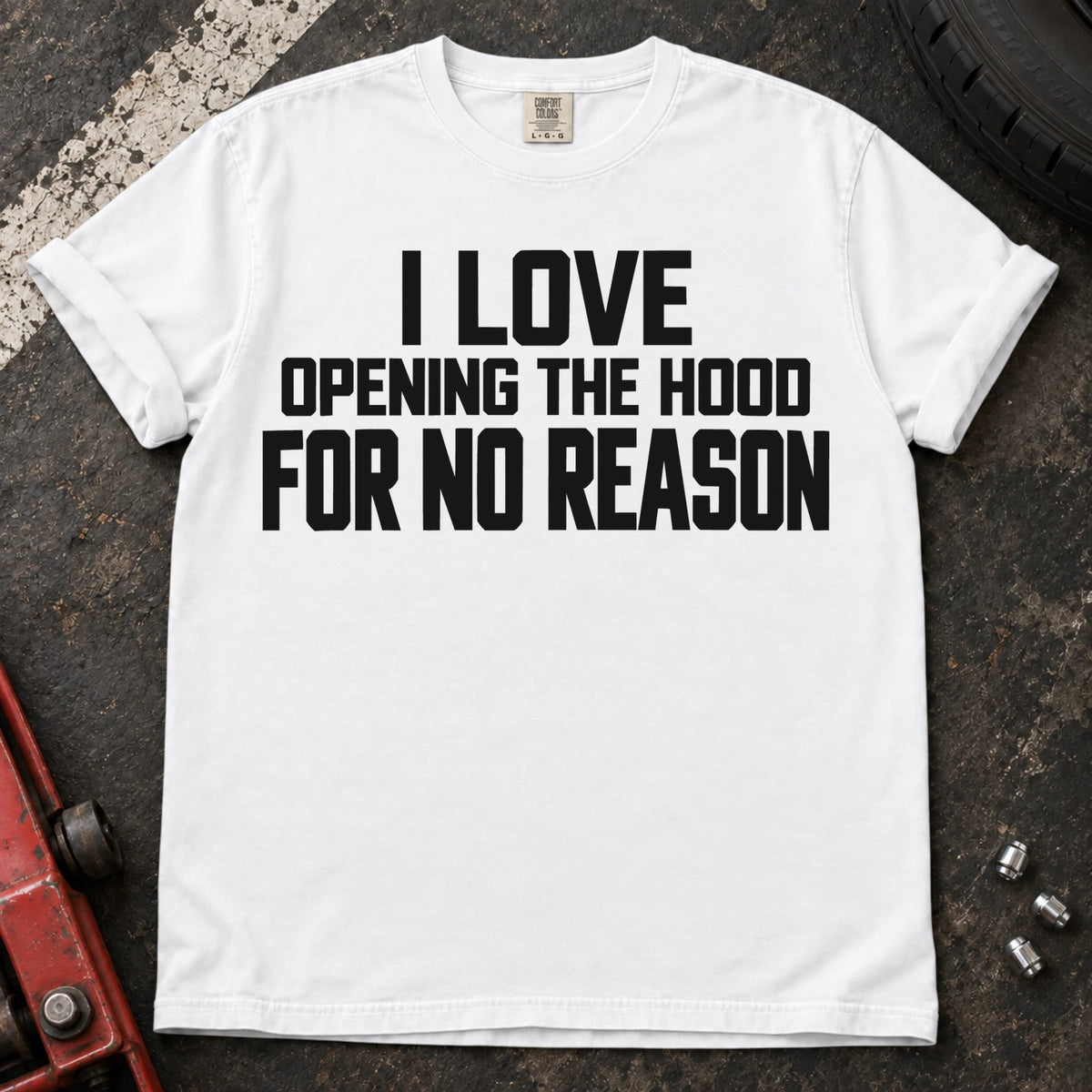 White T-shirt with bold lettering reading 'I love opening the hood for no reason'.