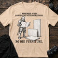 Natural gaming T-shirt. A knight reads instructions for furniture, recalling when games came with manuals.