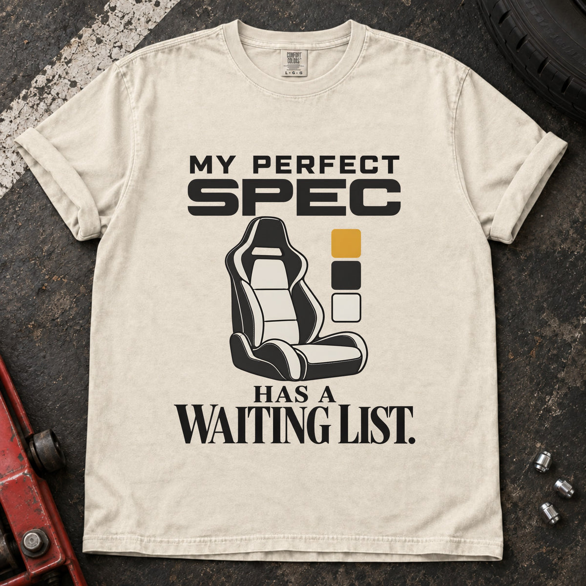 Ivory T-shirt showing a car seat and color swatches with 'My perfect spec has a waiting list'.