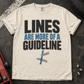 Ivory car enthusiast T-shirt. A road line and tire tracks argue lines are more of a guideline.