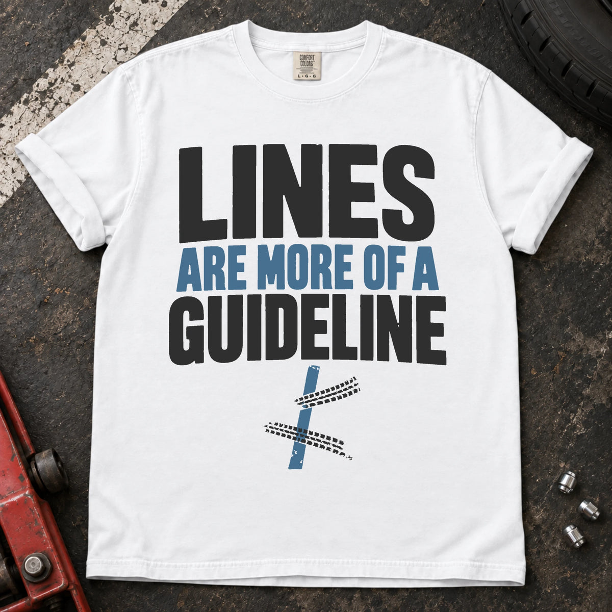 White car enthusiast T-shirt. A road line and tire tracks argue lines are more of a guideline.