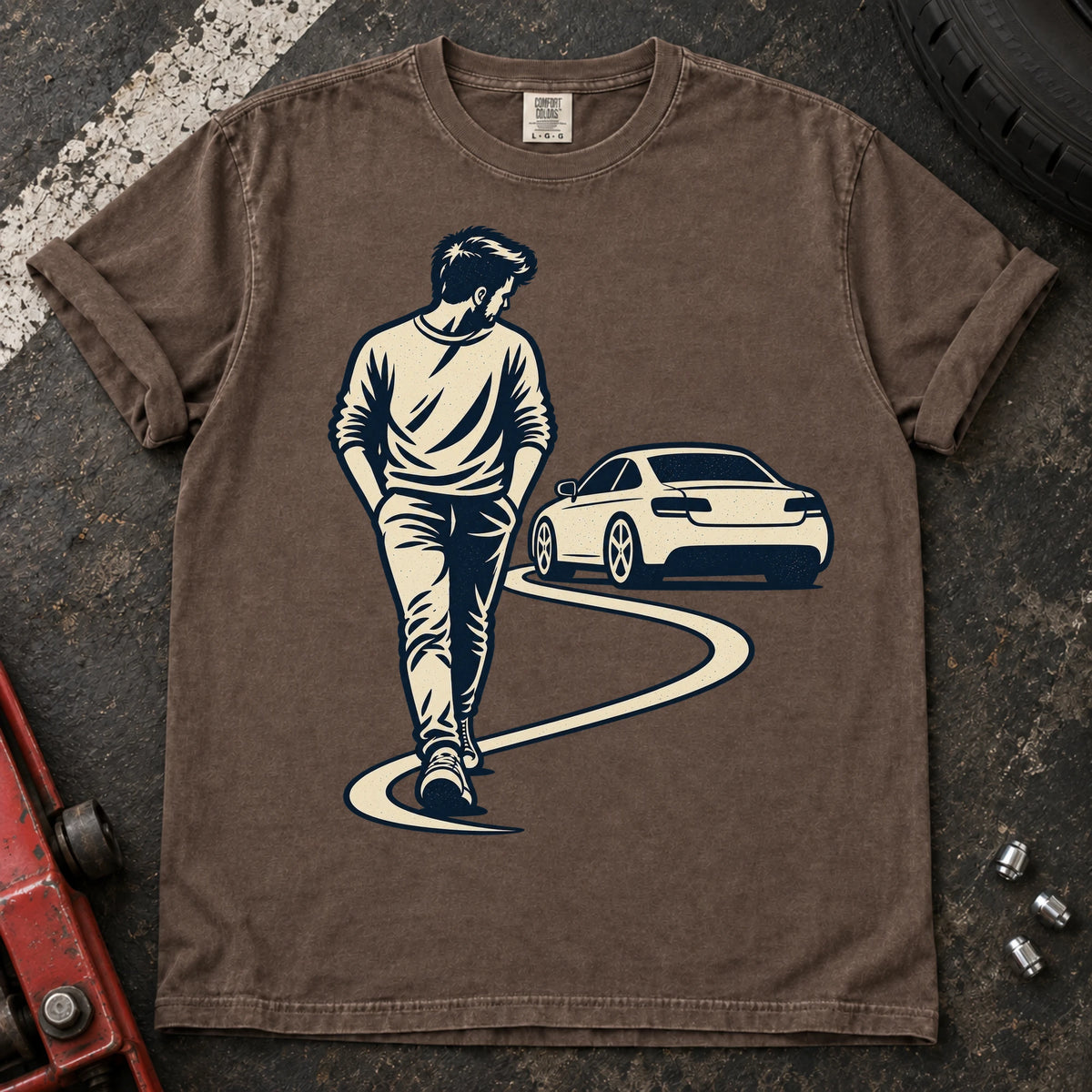 Espresso car enthusiast T-shirt. A driver looks back at a parked car while walking away.