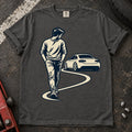 Pepper car enthusiast T-shirt. A driver looks back at a parked car while walking away.