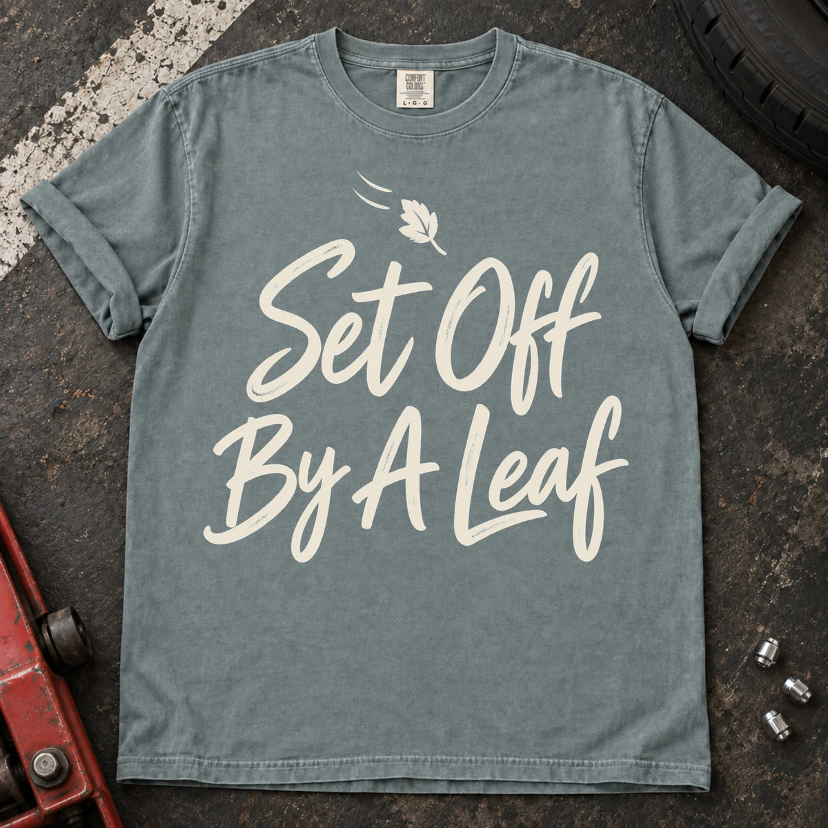 Bay car enthusiast T-shirt. A falling leaf accompanies set off by a leaf.