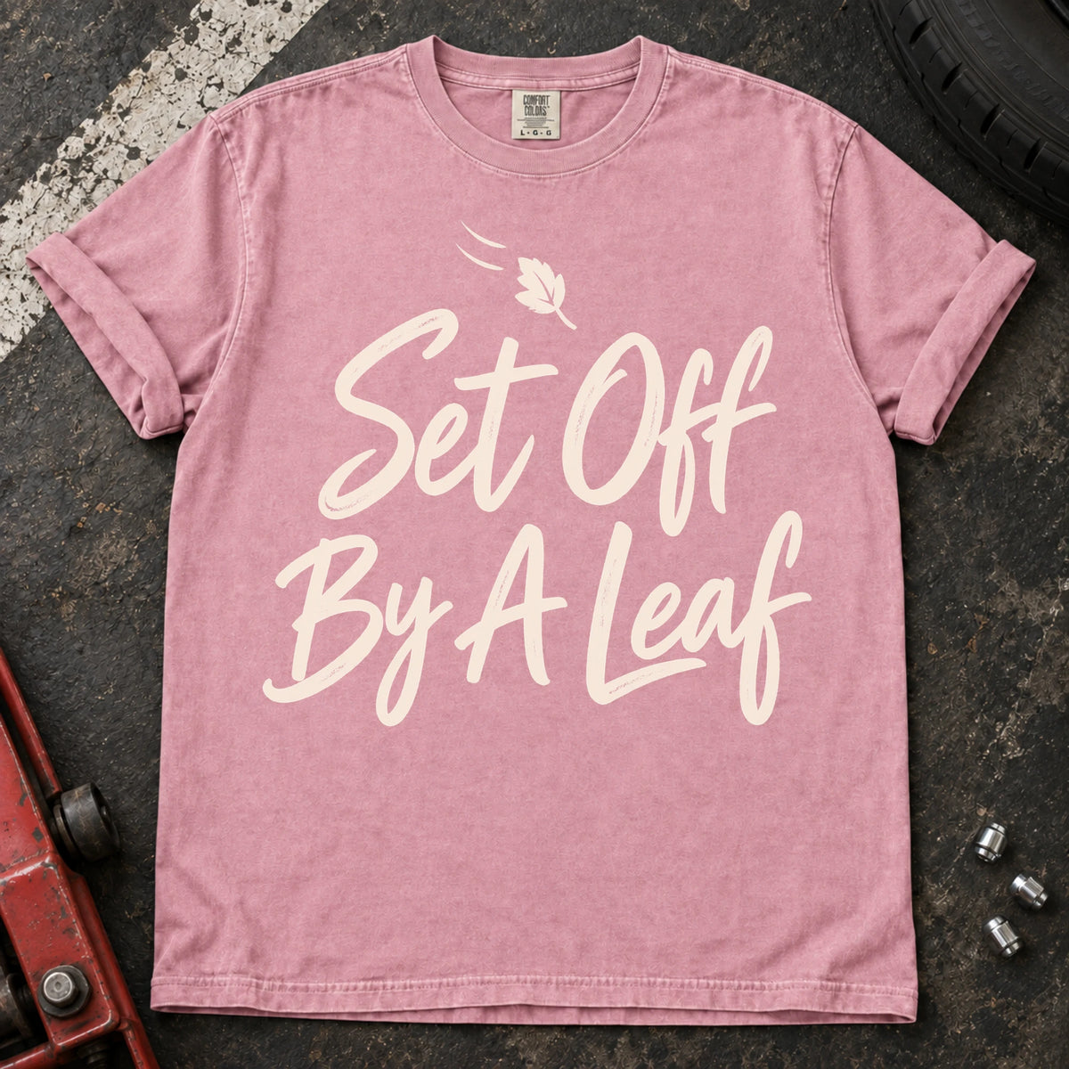 Blossom car enthusiast T-shirt. A falling leaf accompanies set off by a leaf.