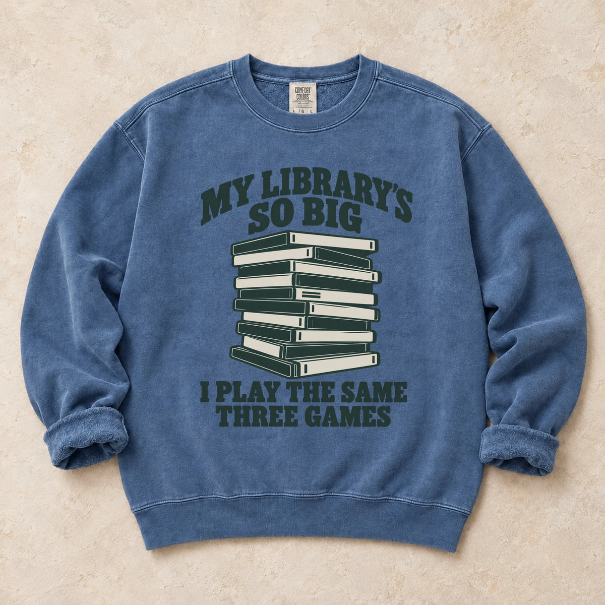 Blue Jean gaming sweatshirt. A huge library stack admits playing the same three games.