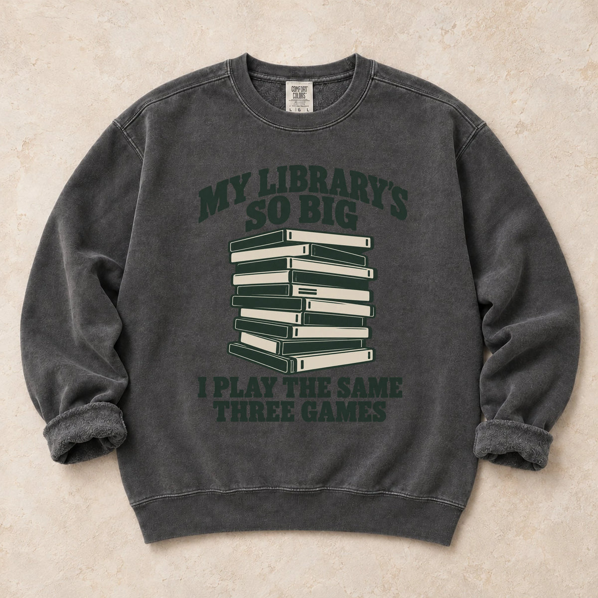 Pepper gaming sweatshirt. A huge library stack admits playing the same three games.