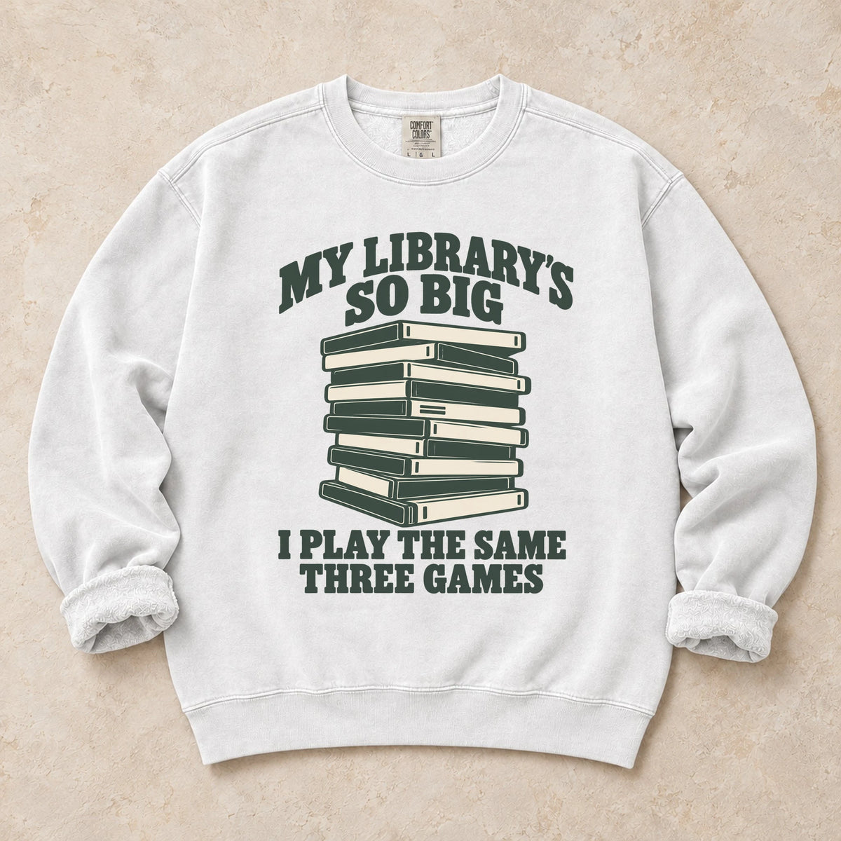 White gaming sweatshirt. A huge library stack admits playing the same three games.
