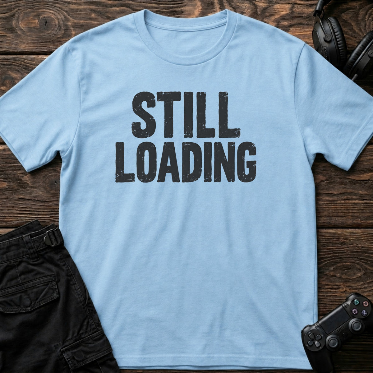Light Blue gaming T-shirt. Still loading, in simple bold gamer typography.