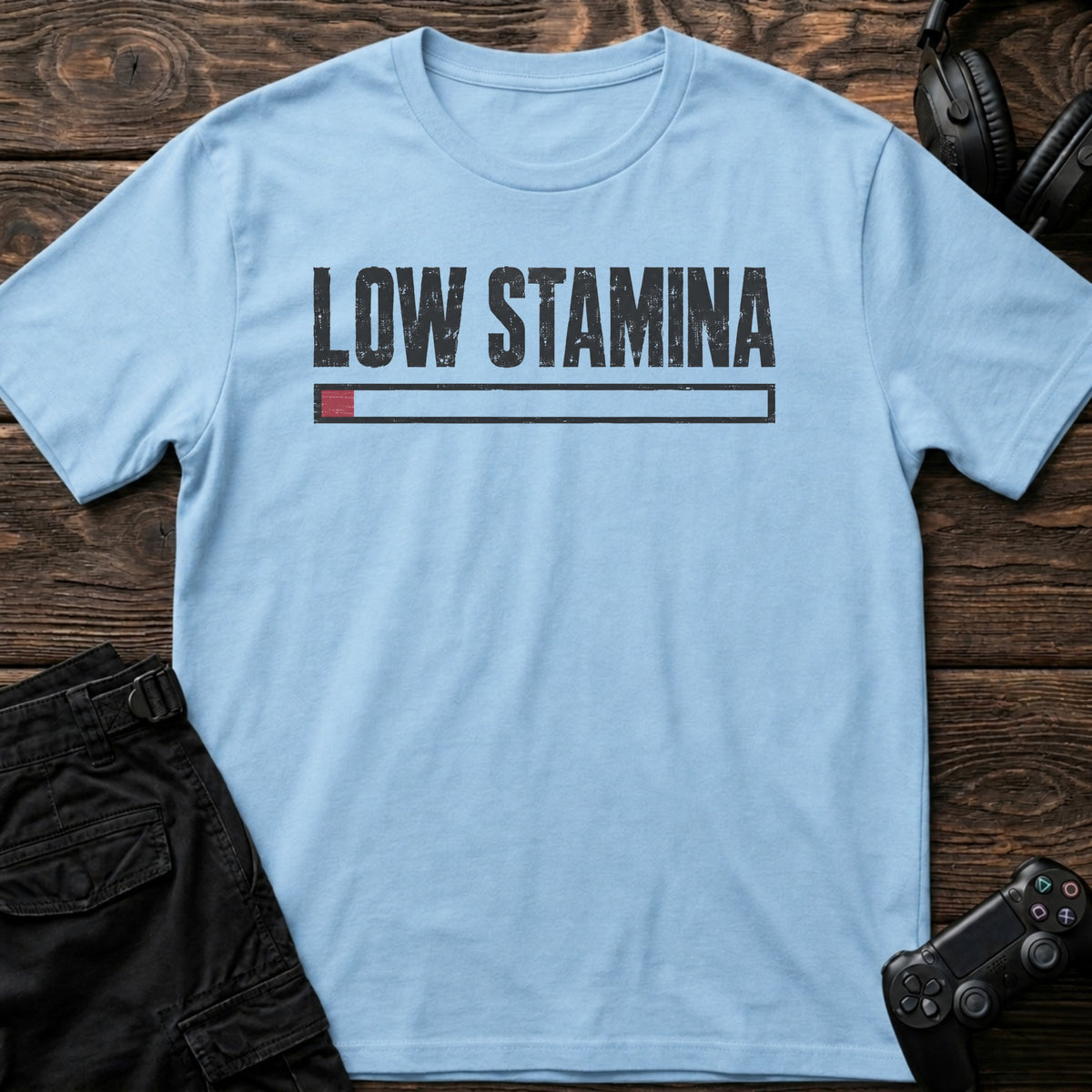 Light Blue gaming T-shirt. A nearly empty stamina bar captures the tired-player mood.