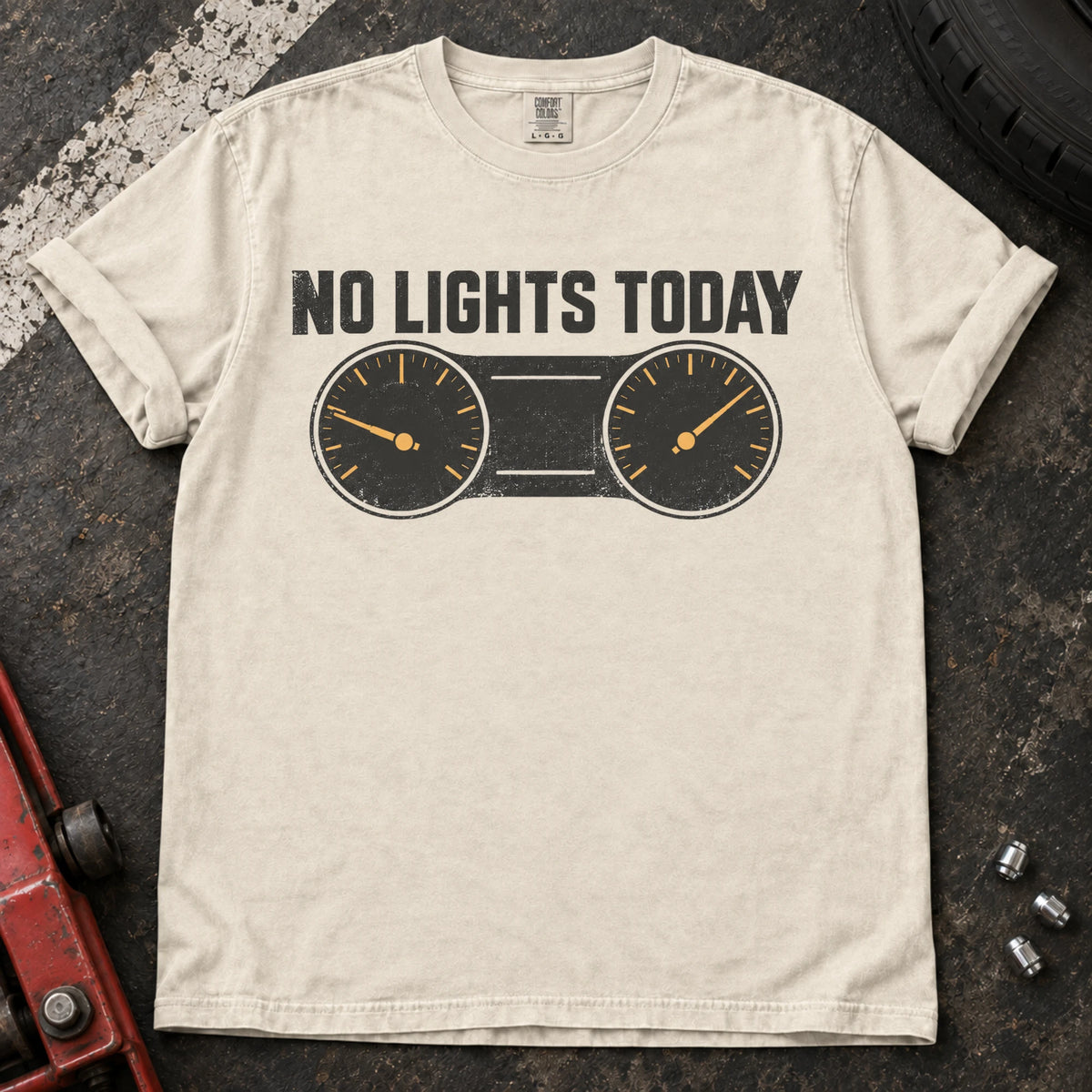 Ivory car enthusiast T-shirt. A gauge cluster celebrates the rare dashboard victory, no lights today.