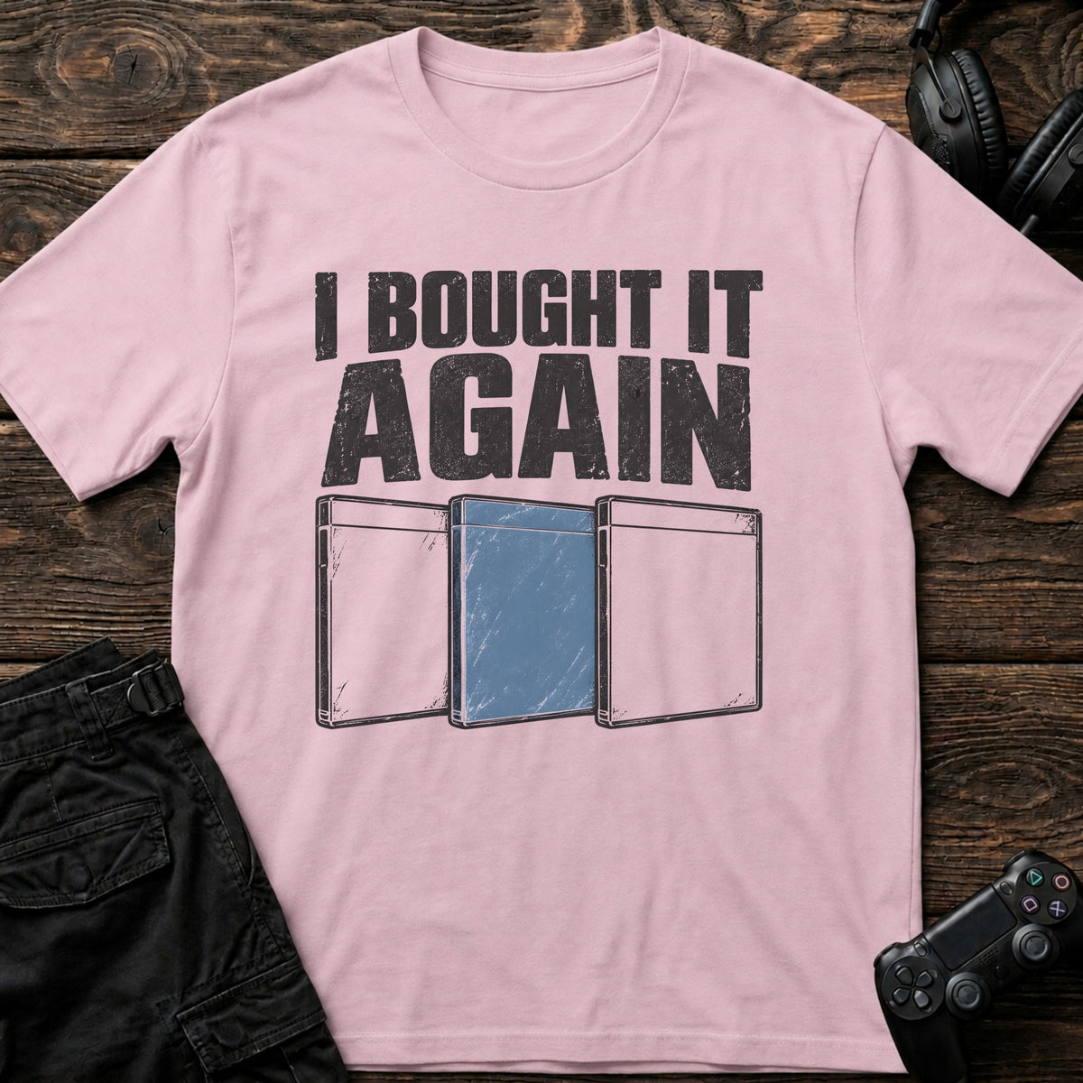 Light Pink gaming T-shirt. Three game cases admit buying it again.