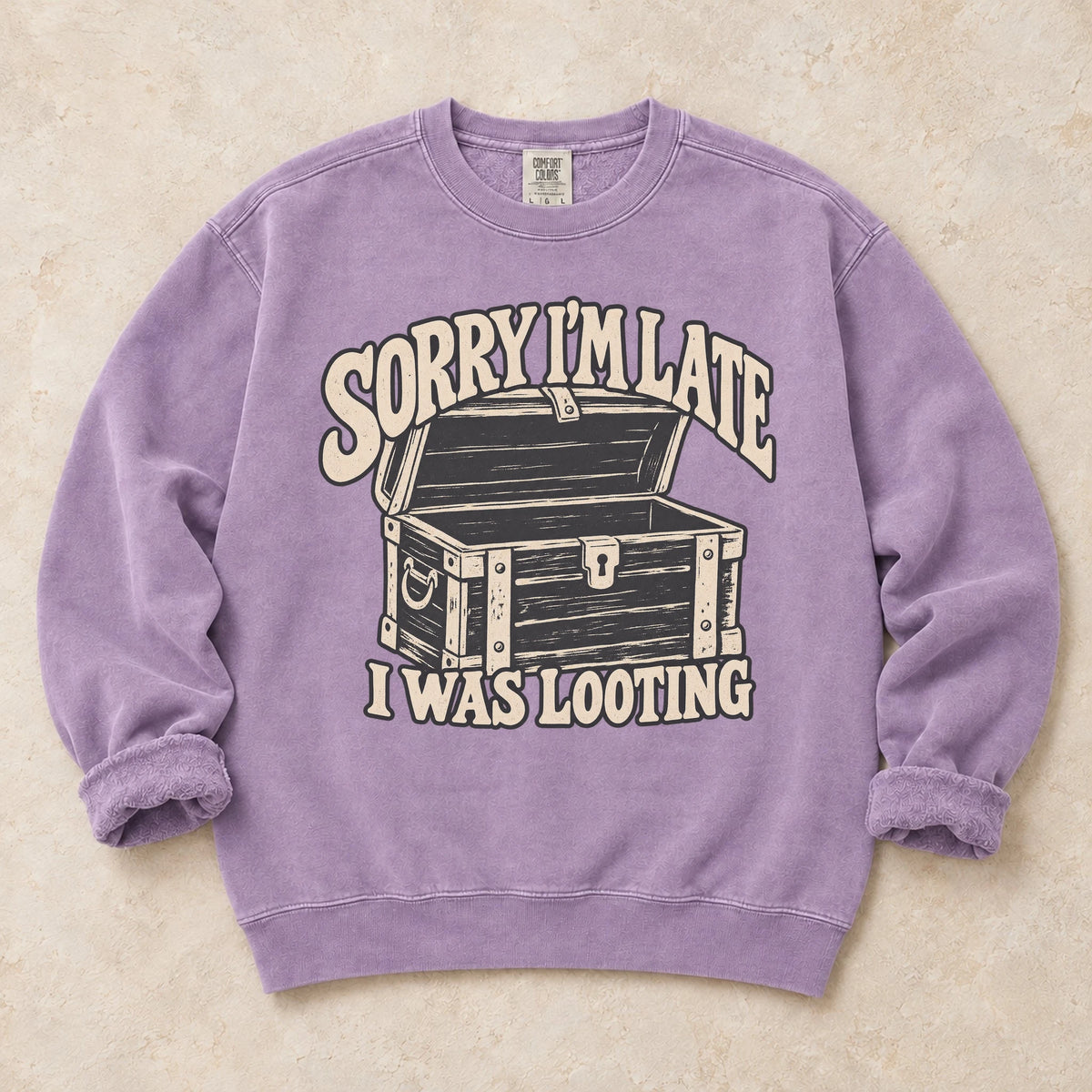 Orchid gaming sweatshirt. A treasure chest explains the apology, sorry I'm late, I was looting.