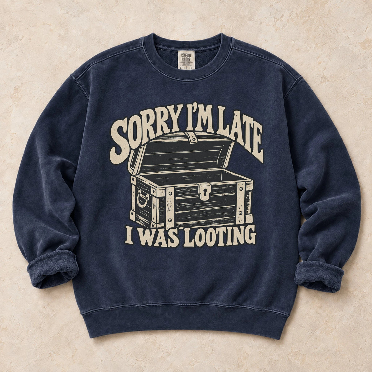 True Navy gaming sweatshirt. A treasure chest explains the apology, sorry I'm late, I was looting.