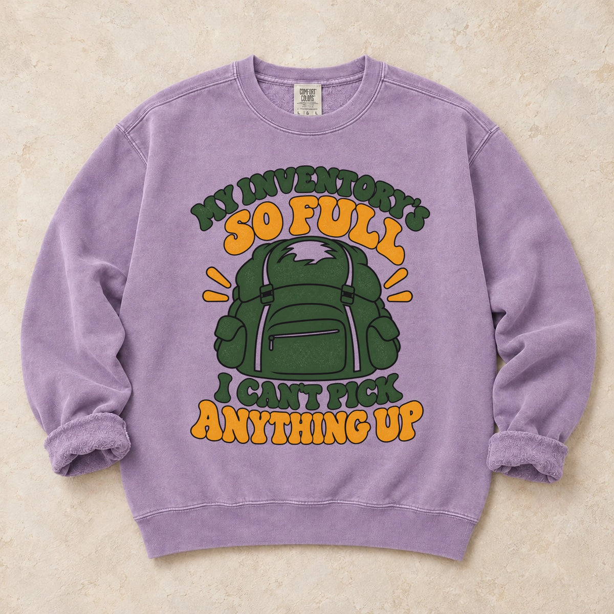 Orchid gaming sweatshirt. A stuffed backpack admits the inventory is too full to pick anything up.