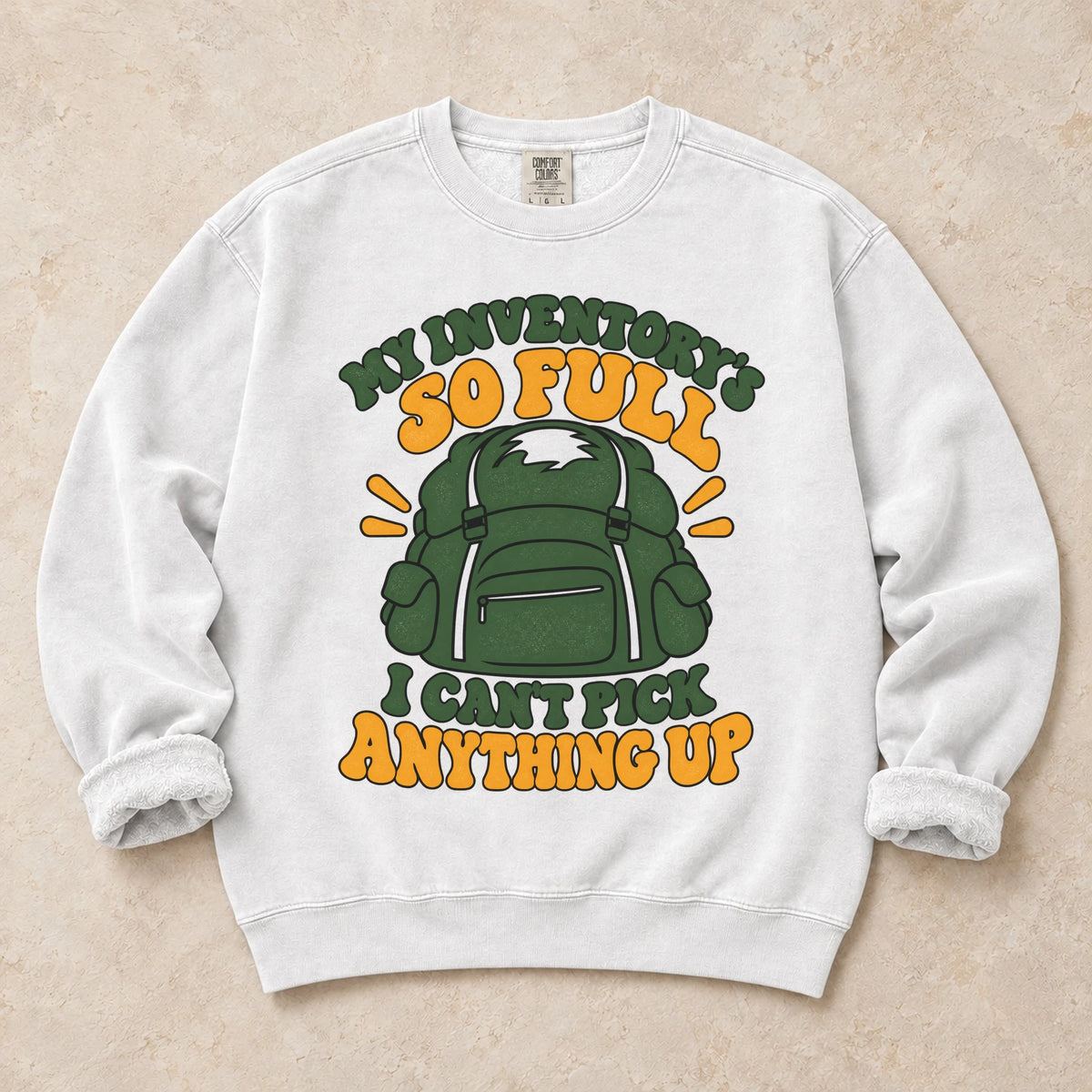 White gaming sweatshirt. A stuffed backpack admits the inventory is too full to pick anything up.