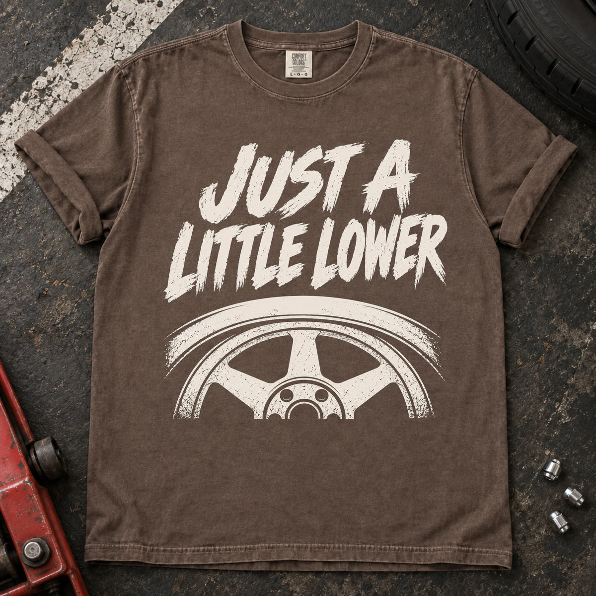 Espresso car enthusiast T-shirt. A wheel tucked under a fender accompanies just a little lower.
