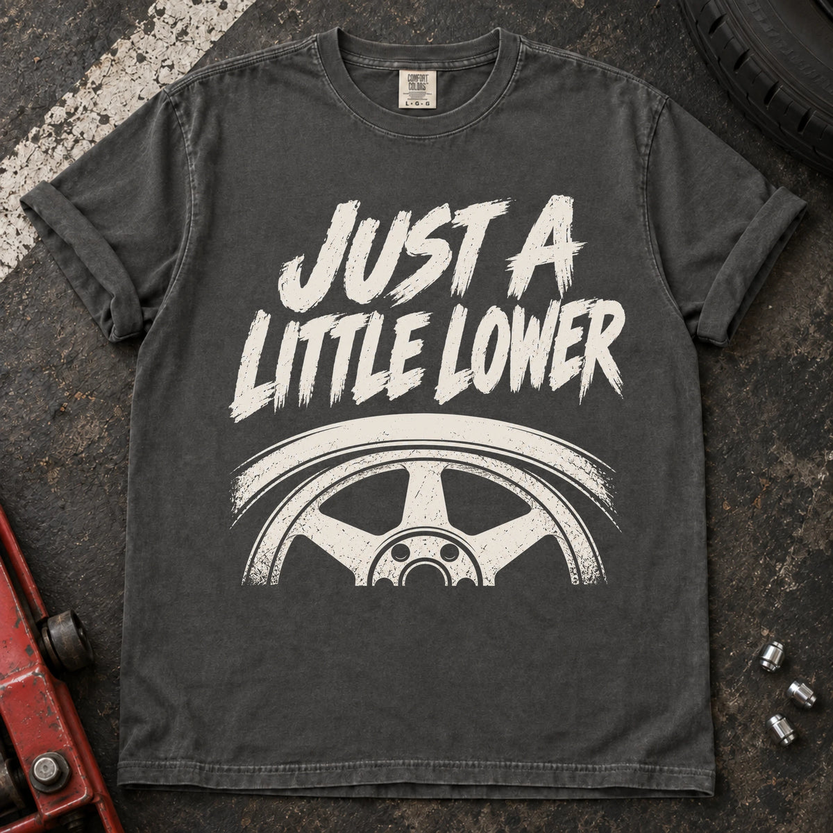 Pepper car enthusiast T-shirt. A wheel tucked under a fender accompanies just a little lower.