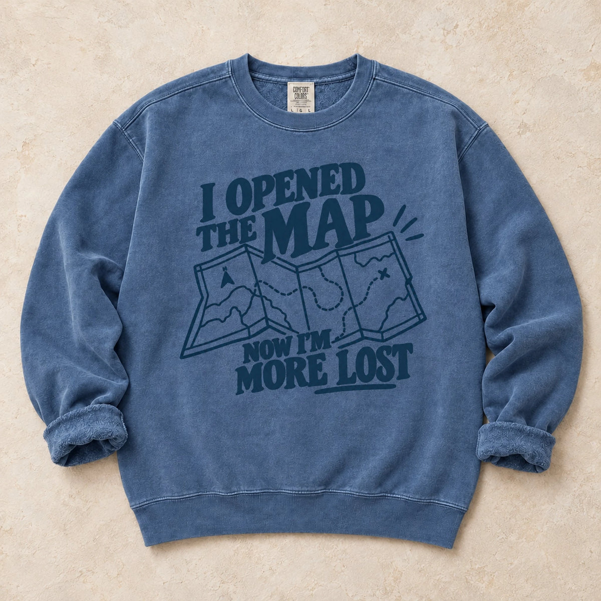 Blue Jean gaming sweatshirt. An unfolded map explains why opening the map made the player more lost.
