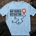 Light Blue gaming T-shirt. A winding route and quest pins capture map-marker distraction.
