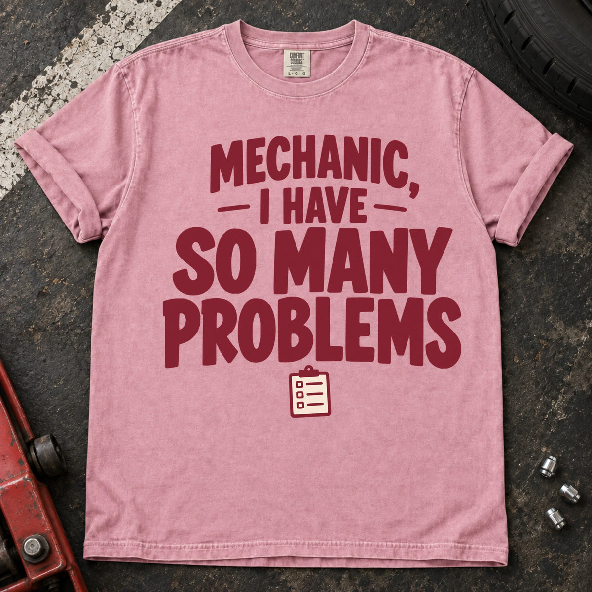 Blossom T-shirt with burgundy lettering reading 'Mechanic, I have so many problems' and a small checklist.