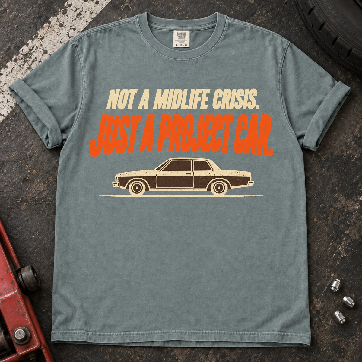 Bay car enthusiast T-shirt. An older sedan explains not a midlife crisis, just a project car.