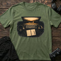 Military Green gaming T-shirt. A lit keyboard, headphones and notebook capture the midnight desk setup.