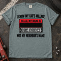 Bay T-shirt showing a name badge and odometer with 'I know my car's mileage, not my neighbor's name'.