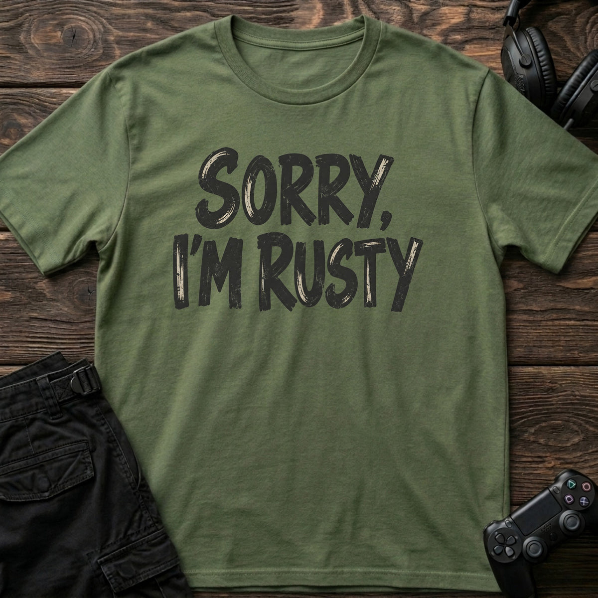 Military Green gaming T-shirt. Sorry, I'm rusty, in bold brush-style gamer lettering.