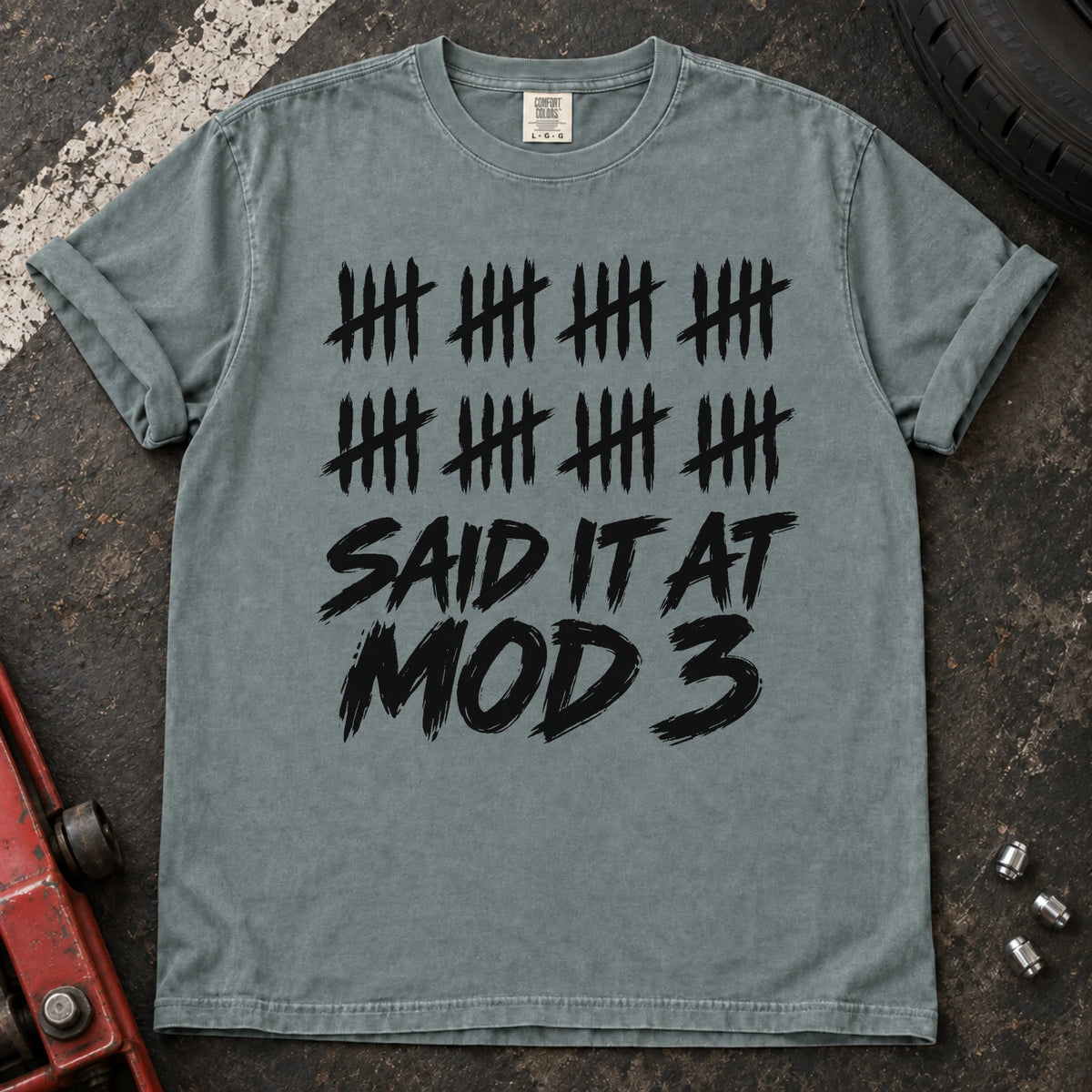 Bay car enthusiast T-shirt. A long row of tally marks proves done-modifying was said at mod three.