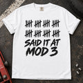 White car enthusiast T-shirt. A long row of tally marks proves done-modifying was said at mod three.