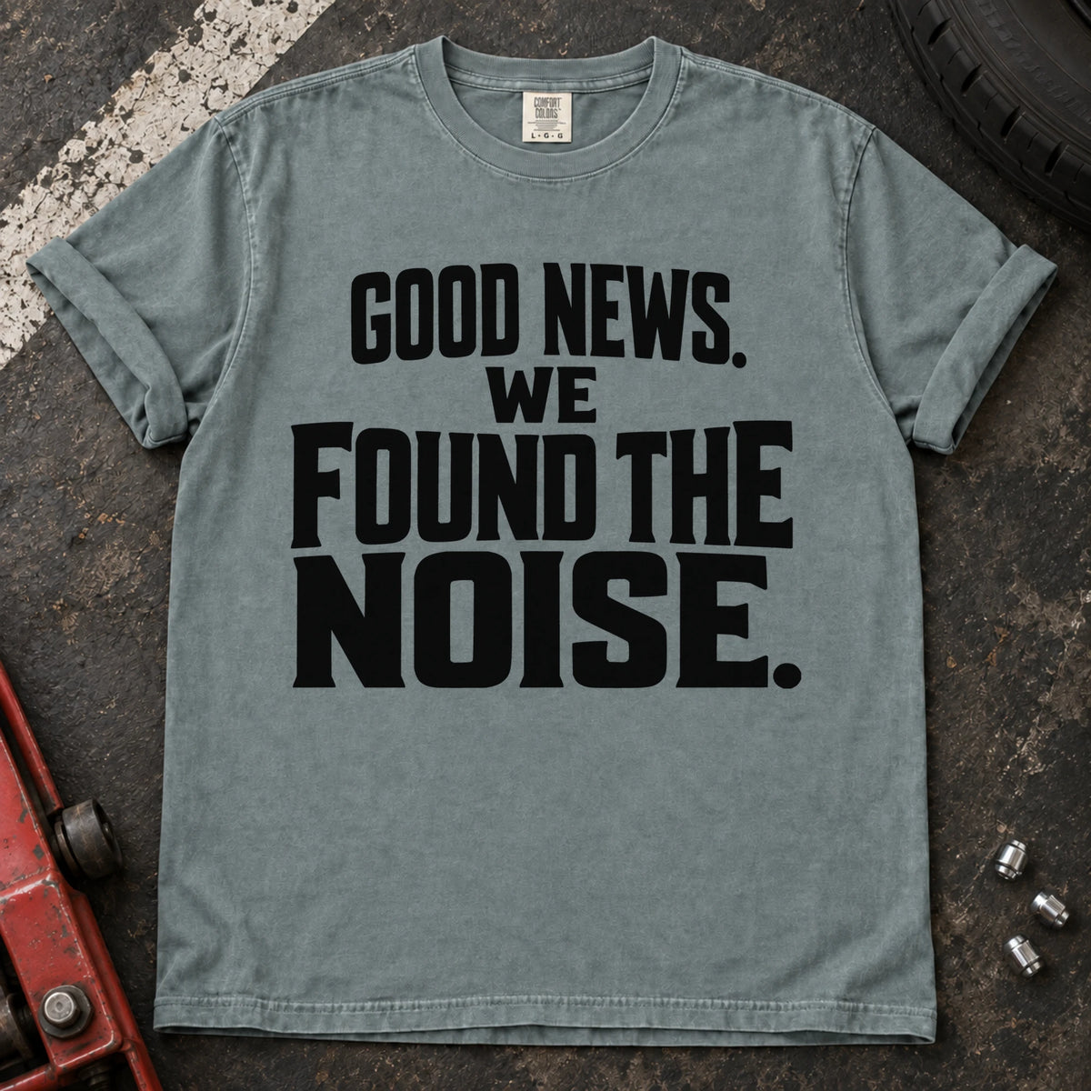 Bay T-shirt with bold stacked lettering reading 'Good news. We found the noise'.