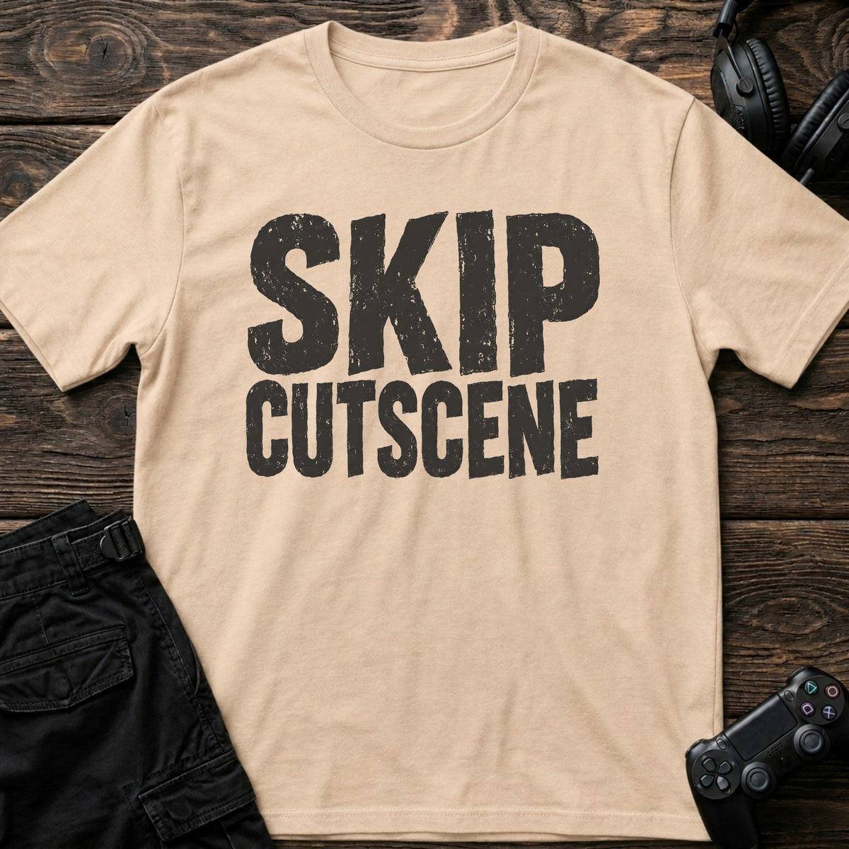 Natural gaming T-shirt. Skip cutscene, in worn bold lettering for impatient gamers.