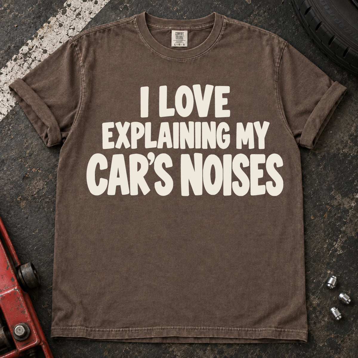 Espresso T-shirt with bold lettering reading 'I love explaining my car's noises'.