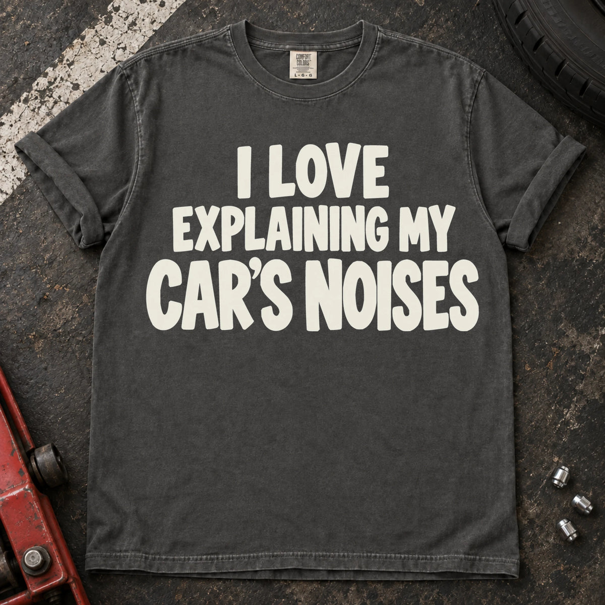 Pepper T-shirt with bold lettering reading 'I love explaining my car's noises'.