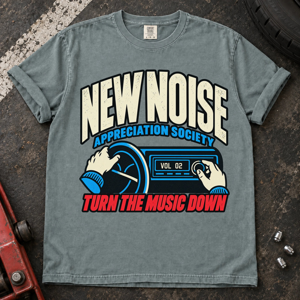 Bay car enthusiast T-shirt. Hands lower the stereo for the New Noise Appreciation Society.