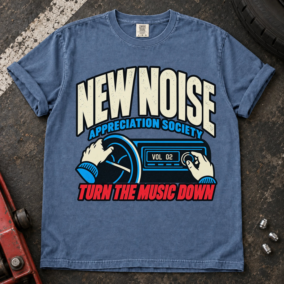 Blue Jean car enthusiast T-shirt. Hands lower the stereo for the New Noise Appreciation Society.